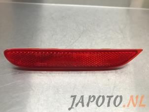 Gebruikte Bumper reflector links-achter Nissan Qashqai (J11) 1.2 DIG-T 16V Prijs € 14,95 Margeregeling aangeboden door Japoto Parts B.V.