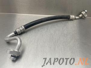 Gebruikte Airco Leiding Nissan Micra (K13) 1.2 12V Prijs € 36,74 Margeregeling aangeboden door Japoto Parts B.V.