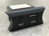 AUX/USB aansluiting van een Kia Rio III (UB), 2011 / 2017 1.2 CVVT 16V, Hatchback, Benzine, 1.248cc, 62kW (84pk), FWD, G4LA, 2011-09 / 2017-12 2016