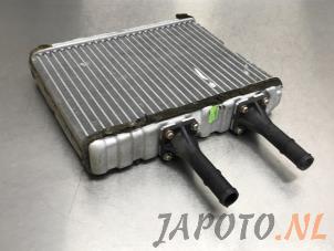 Gebruikte Chaufage Radiateur Nissan Almera (N16) 1.8 16V Prijs € 35,00 Margeregeling aangeboden door Japoto Parts B.V.