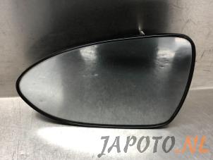 Gebruikte Spiegelglas links Kia Rio III (UB) 1.1 CRDi VGT 12V Prijs € 12,50 Margeregeling aangeboden door Japoto Parts B.V.