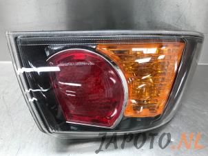 Gebruikte Achterlicht links Mitsubishi Lancer Sports Sedan (CY/CZ) 1.8 MIVEC 16V Prijs € 79,95 Margeregeling aangeboden door Japoto Parts B.V.