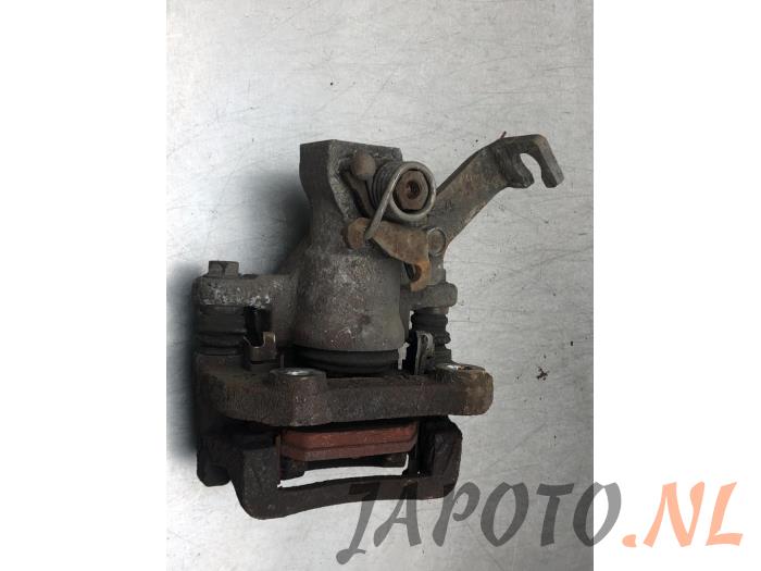 Remklauw (Tang) links-achter van een Suzuki Swift (ZA/ZC/ZD) 1.2 16V 2011