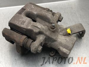 Gebruikte Remklauw (Tang) links-achter Suzuki Swift (ZA/ZC/ZD) 1.2 16V Prijs € 68,20 Margeregeling aangeboden door Japoto Parts B.V.