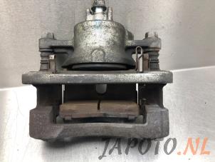 Gebruikte Remklauw (Tang) rechts-voor Suzuki Ignis (MF) 1.2 Dual Jet 16V Prijs € 59,95 Margeregeling aangeboden door Japoto Parts B.V.