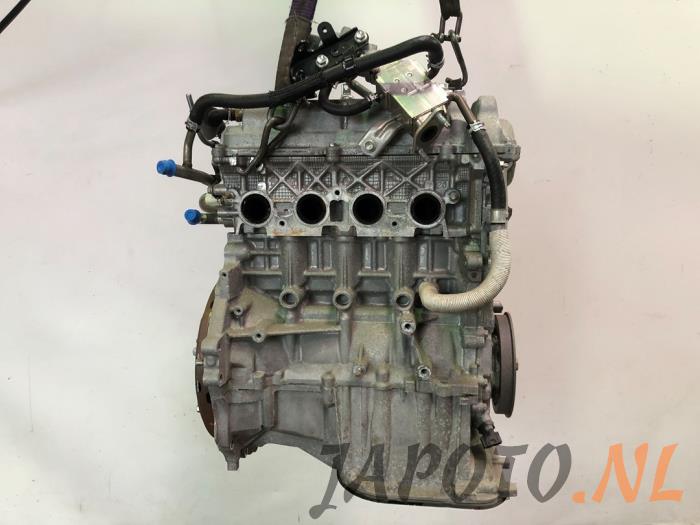 Motor van een Toyota Yaris III (P13) 1.5 16V Hybrid 2015