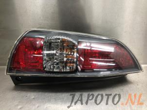 Gebruikte Achterlicht links Daihatsu Sirion 2 (M3) 1.3 16V DVVT Prijs € 34,95 Margeregeling aangeboden door Japoto Parts B.V.