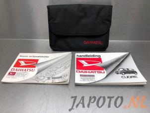 Gebruikte Instructie Boekje Daihatsu Cuore (L251/271/276) 1.0 12V Prijs € 9,95 Margeregeling aangeboden door Japoto Parts B.V.