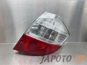 Gebruikte Achterlicht rechts Honda Jazz (GE6/GE8/GG/GP) 1.4 VTEC 16V Prijs € 74,95 Margeregeling aangeboden door Japoto Parts B.V.