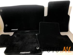Gebruikte Matten Set Mazda 2 (DJ/DL) 1.5 SkyActiv-G 90 Prijs € 49,95 Margeregeling aangeboden door Japoto Parts B.V.