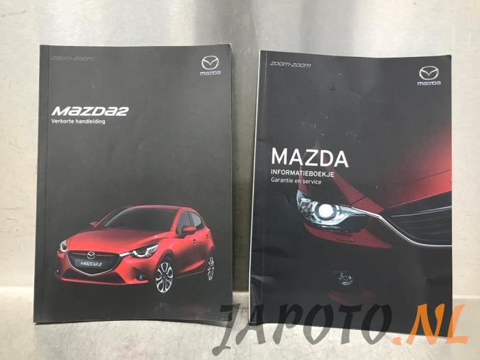 Instructie Boekje Mazda 2.