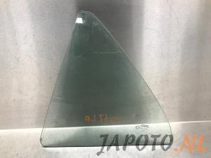 Gebruikte Extra Ruit 4Deurs links-achter Toyota Corolla (E21/EA1/EH1) 1.8 16V Hybrid Prijs € 52,45 Margeregeling aangeboden door Japoto Parts B.V.