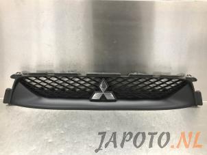 Gebruikte Grille Mitsubishi ASX 1.6 MIVEC 16V Prijs € 78,74 Margeregeling aangeboden door Japoto Parts B.V.