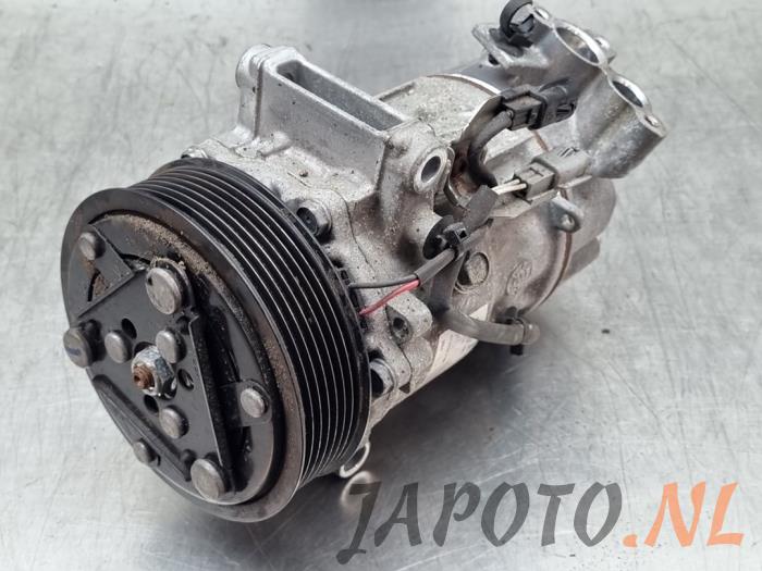 Gebruikte Aircopomp Nissan Juke (F16) 1.0 DIG-T 12V Prijs € 262,45 Margeregeling aangeboden door Japoto Parts B.V.