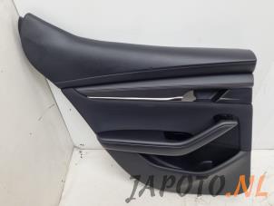 Gebruikte Deurbekleding 4Deurs links-achter Mazda 3 Sport (BP) 2.0 SkyActiv-X M Hybrid 16V Prijs € 78,70 Margeregeling aangeboden door Japoto Parts B.V.