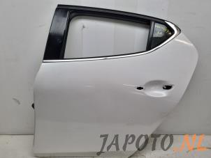 Gebruikte Portier 4Deurs links-achter Mazda 3 Sport (BP) 2.0 SkyActiv-X M Hybrid 16V Prijs € 367,49 Margeregeling aangeboden door Japoto Parts B.V.