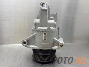 Gebruikte Pomp Airco Nissan Micra (K14) 0.9 IG-T 12V Prijs € 209,95 Margeregeling aangeboden door Japoto Parts B.V.