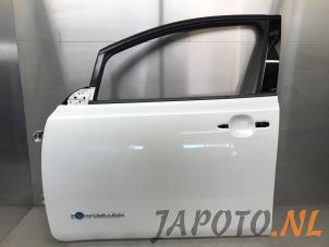 Gebruikte Portier 4Deurs links-voor Nissan Leaf (ZE1) 39/40kWh Prijs € 523,95 Margeregeling aangeboden door Japoto Parts B.V.