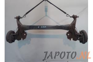 Gebruikte Achteras voorwielaandrijving Mitsubishi Colt (Z2/Z3) 1.5 16V CZT Turbo Prijs € 131,20 Margeregeling aangeboden door Japoto Parts B.V.