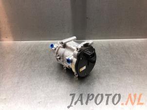 Gebruikte Pomp Airco Toyota Yaris IV (P21/PA1/PH1) 1.5 12V Hybrid 115 Prijs € 367,45 Margeregeling aangeboden door Japoto Parts B.V.
