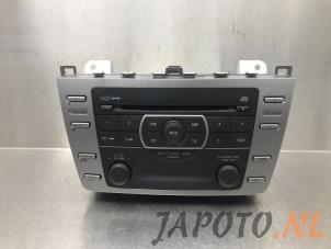 Gebruikte Radio CD Speler Mazda 6 SportBreak (GH19/GHA9) 2.0i 16V S-VT Prijs € 78,70 Margeregeling aangeboden door Japoto Parts B.V.