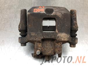 Gebruikte Remklauw (Tang) links-voor Mitsubishi Space Star (A0) 1.0 12V Prijs € 20,95 Margeregeling aangeboden door Japoto Parts B.V.