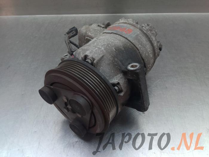 Gebruikte Aircopomp Nissan Qashqai (J10) 2.0 16V Prijs € 131,20 Margeregeling aangeboden door Japoto Parts B.V.