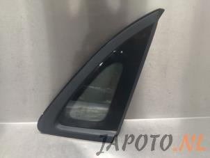 Gebruikte Driehoeks Ruit rechts-achter Hyundai Kona (OS) 39 kWh Prijs € 36,70 Margeregeling aangeboden door Japoto Parts B.V.