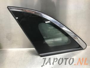 Gebruikte Driehoeks Ruit links-achter Kia Niro I (DE) 1.6 GDI Hybrid Prijs € 52,45 Margeregeling aangeboden door Japoto Parts B.V.