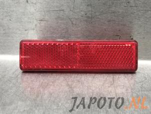 Gebruikte Bumper reflector links-achter Nissan NV 200 Evalia (M20M) E-NV200 Prijs € 25,35 Inclusief btw aangeboden door Japoto Parts B.V.