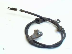 Gebruikte Handrem Kabel Mitsubishi Colt (Z2/Z3) 1.5 16V CZ3 Prijs € 21,00 Margeregeling aangeboden door Japoto Parts B.V.