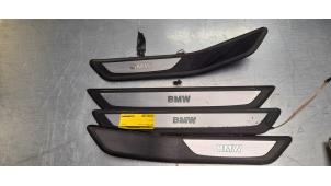 Gebruikte Sierstrip BMW 7 serie (F01/02/03/04) 750i,Li,LiS V8 32V Prijs € 50,00 Margeregeling aangeboden door Poolman autodemontage