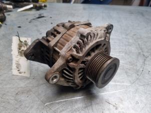 Gebruikte Alternator Nissan Navara (D40) 2.5 dCi 16V 4x4 Prijs € 50,00 Margeregeling aangeboden door Poolman autodemontage