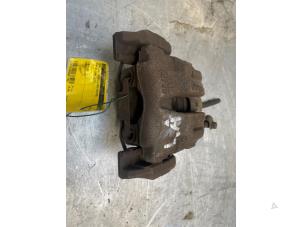 Gebruikte Remklauw (Tang) links-achter BMW X1 (E84) sDrive 20i 2.0 16V Twin Power Turbo Prijs € 30,00 Margeregeling aangeboden door Poolman autodemontage
