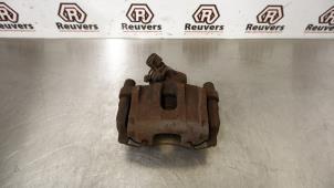 Gebruikte Remklauw (Tang) links-achter Ford Focus 3 1.0 Ti-VCT EcoBoost 12V 100 Prijs € 35,00 Margeregeling aangeboden door Autorecycling Reuvers B.V.