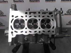 Gebruikte Cilinderkop Daihatsu Cuore (L251/271/276) 1.0 12V DVVT Prijs € 150,00 Margeregeling aangeboden door Autorecycling Reuvers B.V.