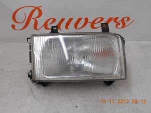 Gebruikte Koplamp rechts Volkswagen Transporter/Caravelle T4 1.9 D,Caravelle Prijs € 25,00 Margeregeling aangeboden door Autorecycling Reuvers B.V.