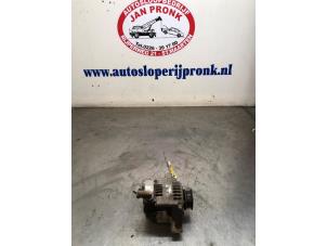 Gebruikte Dynamo Daihatsu Cuore (L701) 1.0 12V Prijs € 40,00 Margeregeling aangeboden door Autosloopbedrijf Jan Pronk B.V.