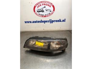 Gebruikte Linker Koplamp Volvo V70 (SW) 2.4 20V 170 Prijs € 75,00 Margeregeling aangeboden door Autosloopbedrijf Jan Pronk B.V.