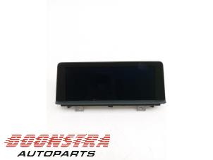 Gebruikte Display Interieur BMW 1 serie (F21) 114i 1.6 16V Prijs € 384,95 Margeregeling aangeboden door Boonstra Autoparts