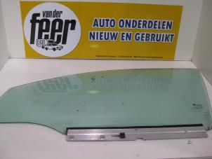 Gebruikte Deurruit 4Deurs links-voor Opel Astra H SW (L35) 1.9 CDTi 100 Prijs € 35,00 Margeregeling aangeboden door Autobedrijf van der Feer