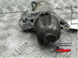 Startmotor van een Mitsubishi Colt (Z2/Z3) 1.5 DI-D 12V HP 2005