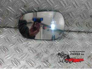 Gebruikte Spiegelglas rechts Renault Clio II (BB/CB) 1.4 Prijs op aanvraag aangeboden door Autosloperij Pieper BV
