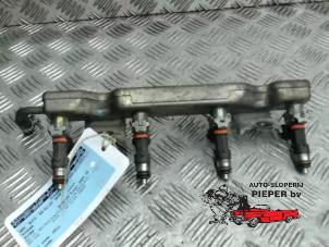 Gebruikte Injector brug Nissan Micra (K12) 1.2 16V Prijs € 52,50 Margeregeling aangeboden door Autosloperij Pieper BV
