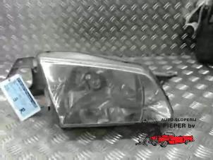 Gebruikte Rechter Koplamp Mazda 323 Fastbreak (BJ14) Prijs € 26,25 Margeregeling aangeboden door Autosloperij Pieper BV