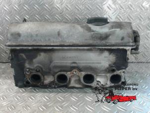 Gebruikte Cilinderkop Volkswagen Polo III (6N1) 1.6i 75 Prijs € 78,75 Margeregeling aangeboden door Autosloperij Pieper BV