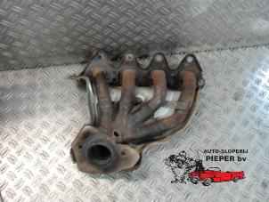 Gebruikte Uitlaatspruitstuk Renault Scénic III (JZ) 1.6 16V Prijs € 36,75 Margeregeling aangeboden door Autosloperij Pieper BV