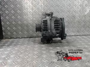 Gebruikte Dynamo BMW 3 serie Touring (E46/3) 318i 16V Prijs € 47,25 Margeregeling aangeboden door Autosloperij Pieper BV