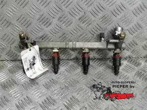 Gebruikte Injector brug Opel Vectra B (36) 2.0 16V Ecotec Prijs € 52,50 Margeregeling aangeboden door Autosloperij Pieper BV