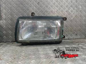 Gebruikte Koplamp links Opel Frontera (6B) 3.2 V6 24V Prijs € 52,50 Margeregeling aangeboden door Autosloperij Pieper BV